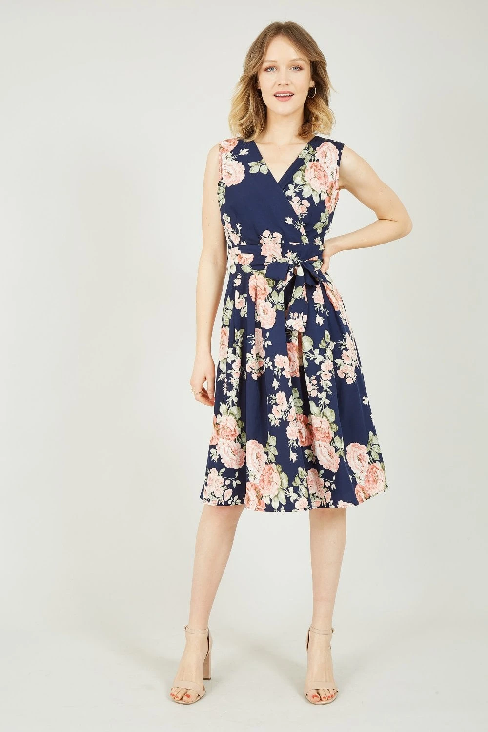 Mela Navy Rose Printed Wrap Over Sleeveless Skater Dress 1 Mela Navy Rose Printed Wrap Over Sleeveless Skater Dress